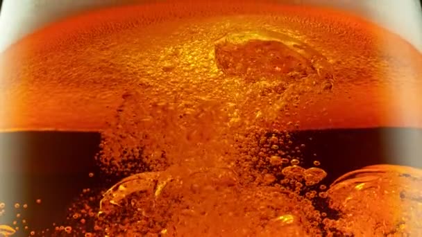 Super Slow Motion Detail Shot Bubbling Swirling Fresh Beer Glass — Stock Video