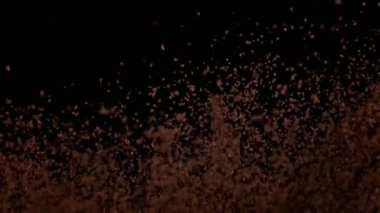Ground Coffee Explosion 'un Süper Yavaş Çekimi Soyut Karanlık Arkaplan' da 1000 fps 'de. Yüksek Hız Sinema Kamerası, 4k.