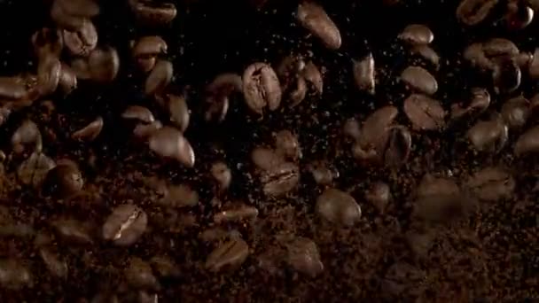 Super Slow Motion Shot Flying Coffee Beans Ground Coffee Isolated — Wideo stockowe