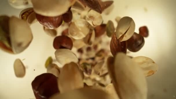 Super Slow Motion Closeup Shot Flying Rotating Various Nuts Camera — Stock video