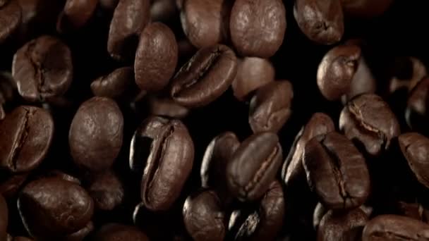 Super Slow Motion Macro Shot Flying Premium Coffee Beans Isolated — Stock Video