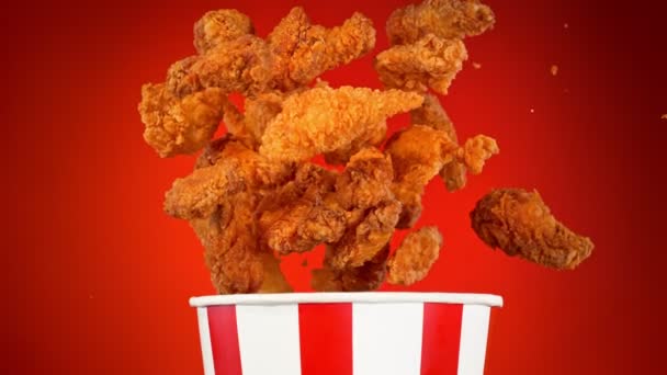 Super Slow Motion Shot Fried Chicken Pieces Exploding Bucket Red — Stock Video