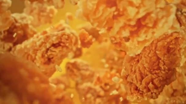 Super Slow Motion Shot Van Flying Fried Chicken Pieces Camera — Stockvideo