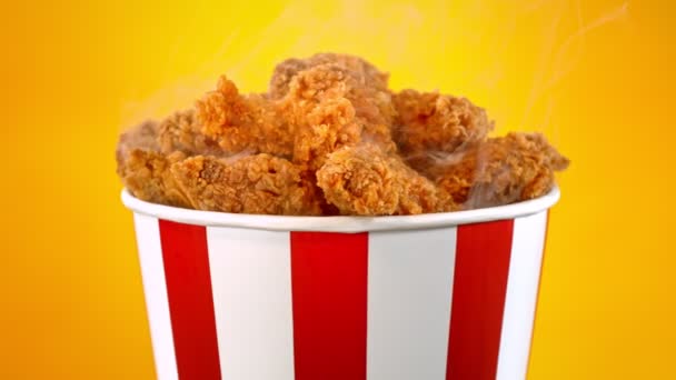 Slow Motion Shot Fried Chicken Pieces Smoke Rotating Bucket Golden — Stock Video