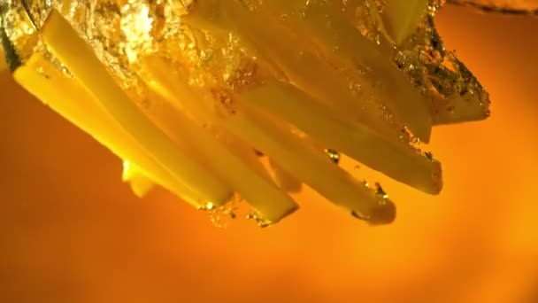 Super Slow Motion Shot Fresh Raw French Fries Falling Boiling — Stock video