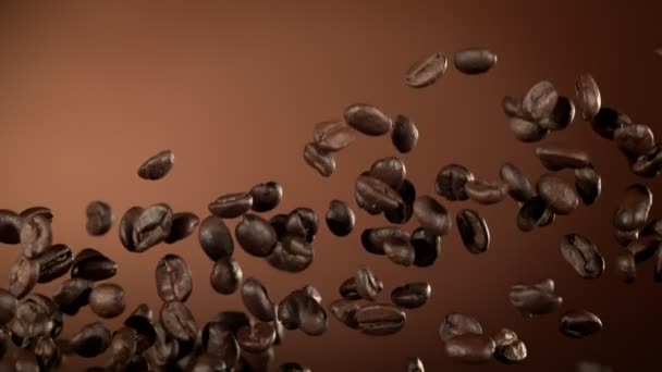 Kahverengi Arkaplanda Kahverengi Fon Uçan Özel Kahve Fasulyesinin Süper Yavaş — Stok video