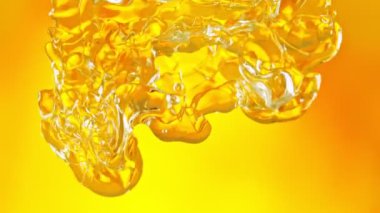 Süper Yavaş Çekim Altın Yağ Suyu 'nun 1000fps hızında akışı. Yüksek Hız Sinema Kamerası, 4K.