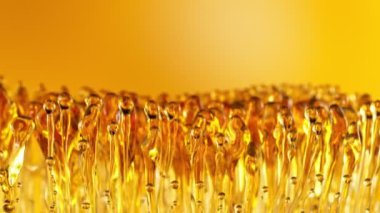 Altın Arkaplanda Su Sıçratan Yağın Süper Yavaş Çekimi 1000fps.