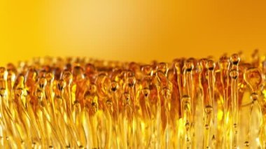 Altın Arkaplanda Su Sıçratan Yağın Süper Yavaş Çekimi 1000fps.