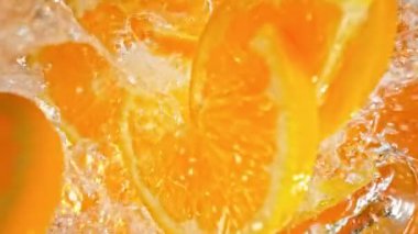 Süper Yavaş Portakal Dilimleri Çekimi. Ardından da 1000 fps hızla suya sıçrayan Kamera. Yüksek Hız Sinema Kamerası, 4K.