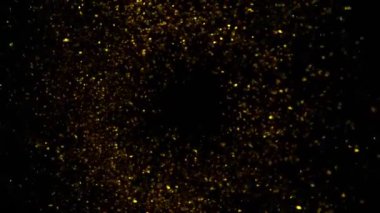 Süper Yavaş Çekim Altın Parıldayan Parçacıklar. Siyah üzerine izole edilmiş ve yüksek hızlı sinema kamerasıyla çekilmiş, 4K.
