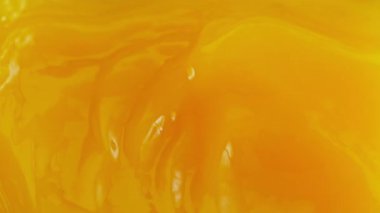 Süper Yavaş Hareket Detaylı Dalgalanan Taze Portakal Suyu. Yüksek Hız Sinema Kamerası, 4K.