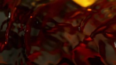 Sallanan Altın Sıvının Süper Yavaş Çekimi, 1000fps 'de. Yüksek Hız Sinema Kamerası, 4K.