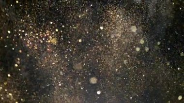 Parıldayan Altın Arkaplan 'ın Süper Yavaş Çekimi, 1000fps' de. Yüksek Hız Sinema Kamerası, 4K.