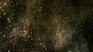 Parıldayan Altın Arkaplan 'ın Süper Yavaş Çekimi, 1000fps' de. Yüksek Hız Sinema Kamerası, 4K.