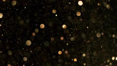 Parıldayan Altın Arkaplan 'ın Süper Yavaş Çekimi, 1000fps' de. Yüksek Hız Sinema Kamerası, 4K.