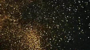 Parıldayan Altın Arkaplan 'ın Süper Yavaş Çekimi, 1000fps' de. Yüksek Hız Sinema Kamerası, 4K.