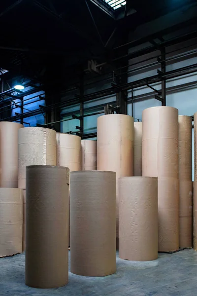 stock image Lots of large rolls of recycled paper wrapping paper, vertical.