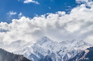 Almaty snowy mountains picturesque landscape. Nature of Qazaqstan in central asia.