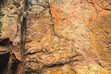 Rock paintings of ancient cavemen in Central Asia.