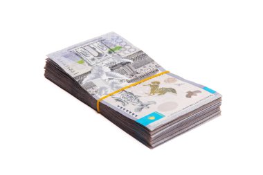Bundle of Qazaqstan money of 20000 tenge tied with an elastic band, isolated on white.