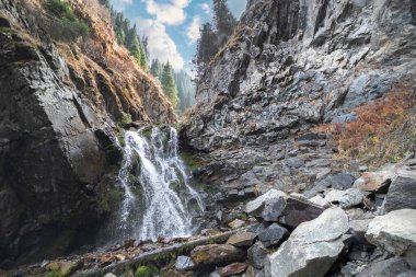 Ayusai waterfall 2 in Bear gorge of Almaty mountains, ile alatau parkland, picturesque nature of Kazakhstan.