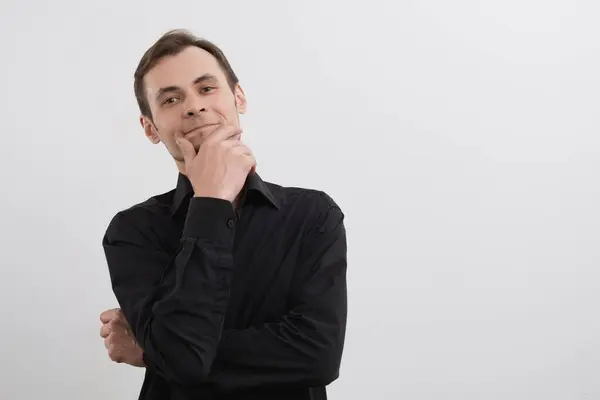 stock image Caucasian man 30s in a black shirt portrait on white background.