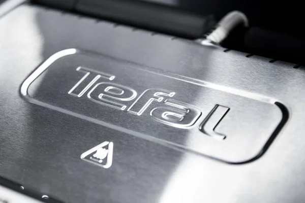 stock image Close-up of the Tefal logo on on steel appliances. Almaty, Kazakhstan - April 15, 2023