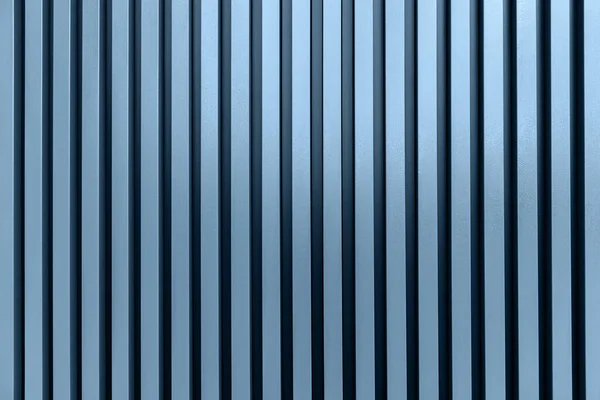 stock image Modern stripped metal industrial blue background.