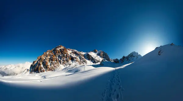 stock image Discover the awe-inspiring high-altitude landscapes of Central Asia. Journey through Kazakhstans Almaty Mountains, a winter wonderland within the majestic Tien Shan range.