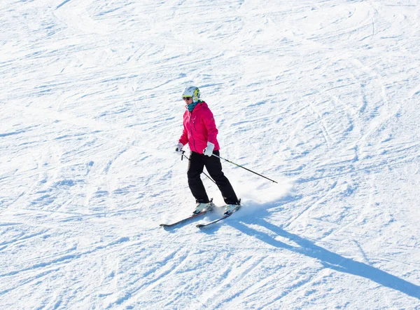 stock image Bialka Tatrzanska, Poland - February 9, 2023: Kotelnica Ski Station in the Tatra Mountains. Tourists and downhill skiing. Equipment for the preparation of the ski slope. Traditional buildings