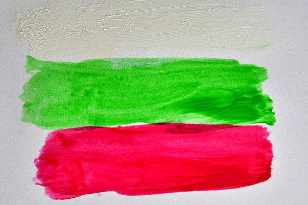 White, green and red lines painted with watercolors similar to the flag of Bulgaria.