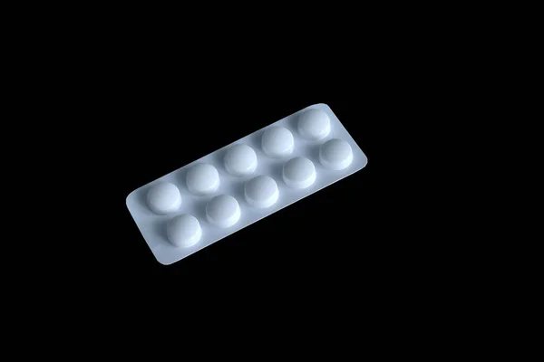 Witte Pillen Een Witte Verpakking Geïsoleerd Een Zwarte Achtergrond Hoge — Stockfoto