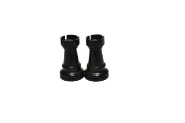 On a white background there are two black chess pieces called a round. clipart