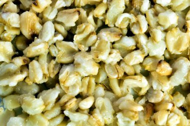 Geçmişi ve dokusu. Kaynamış inci arpa, yakın plan. Üst görünüm.