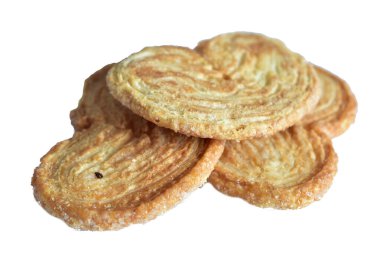 Beyaz arka planda izole edilmiş palmier kurabiyeler ya da kabarık pasta kulakları. Kalp şeklinde çerezler. Tam alan derinliği. - Yakın çekim. Yüksek kalite fotoğraf