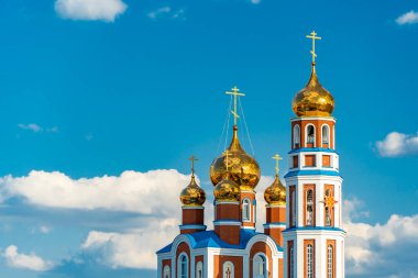 Gospel of Jesus Christ. The religious church is a chapel for praying to God.Golden domes with a crucifix at the top.A holy place for Orthodox Christians and Catholics.Holy is the Savior of the spirit