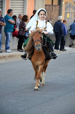 Villacidro, Sardinia 06.02.2019: Cherry's festival with traditional costumes of Sardinia clipart