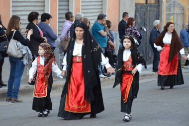 Villacidro, Sardinia 06.02.2019: Cherry's festival with traditional costumes of Sardinia clipart