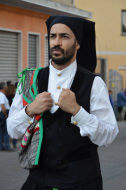 Villacidro, Sardinia 06.02.2019: Cherry's festival with traditional costumes of Sardinia clipart