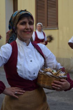 Villacidro, Sardinia 06.02.2019: Cherry's festival with traditional costumes of Sardinia clipart