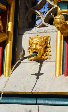 Detail of the Schoner Brunnen fountain and statue in market square of Nuremberg, Germany clipart