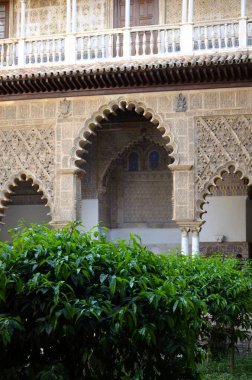 Seville, Spain 03.24.2019: Patio de las Doncellas inside the Real Alcazar Royal Palace