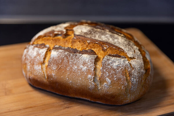freshly baked bread on wooden board
