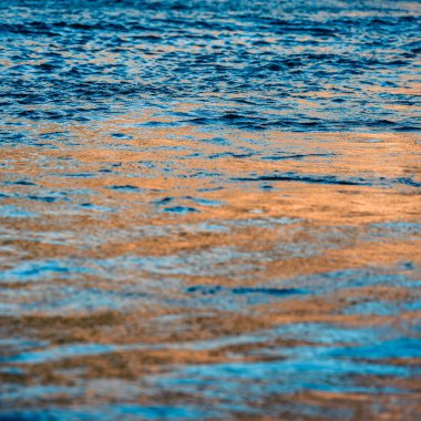 Golden Hour Reflection of Sunlight on Rippling Water Surface in Southern Croatians Coastal Landscape clipart