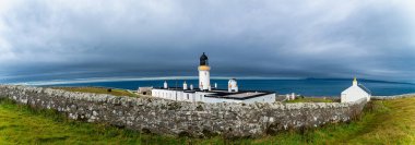 Dunnet Head, a rounded, cliffed sandstone headland in the Highland council area, Scotland, that is the northernmost point on the mainland of Great Britain clipart