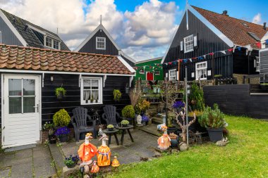 Typical Dutch village scene with wooden houses on the island of Marken in the Netherlands, Holland