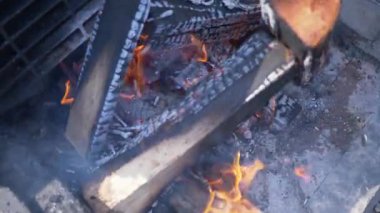 Slow motion fireplace scene. Fireplace with camera movement. Campfire in the day time.