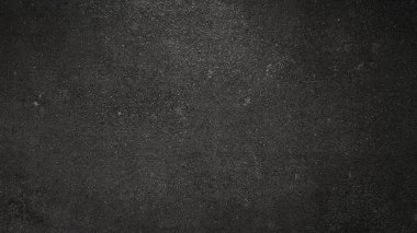 Taklit siyah kumlu siyah taş arka plan. Arkaplan için taklit siyah kum