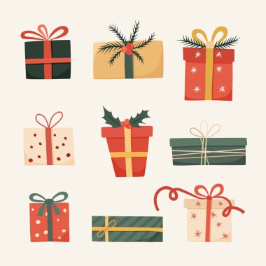 Dokuz renkli Noel hediye kutusu. Dekoratif yaylar ve kutsal bayram öğeleri ve çam dalları ile şenlikli hediyeler.